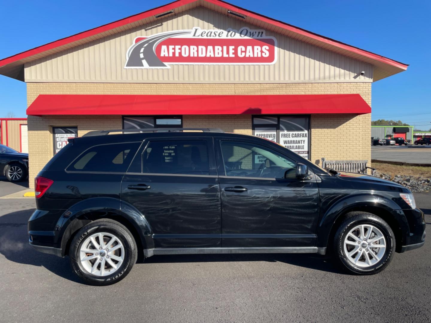 2017 Black Dodge Journey (3C4PDCBGXHT) with an V6, 3.6 Liter engine, Auto, 6-Spd AutoStick transmission, located at 8008 Warden Rd, Sherwood, AR, 72120, (501) 801-6100, 34.830078, -92.186684 - Photo#0